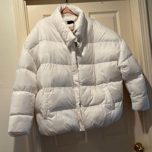 White puffer jacket.